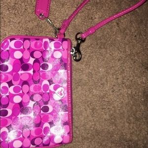 Coach pink and white leather wristlet